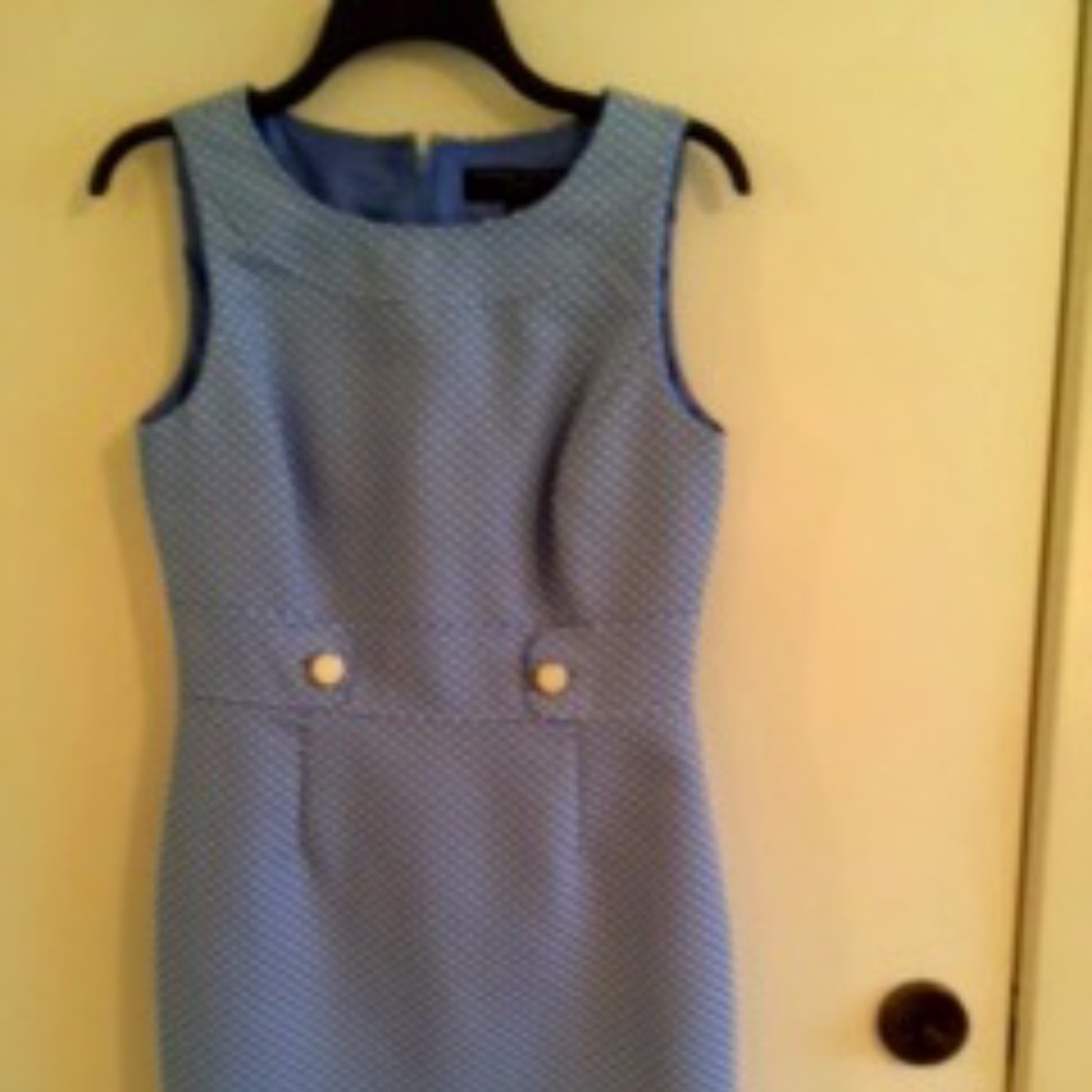 Light-blue/white sleeveless dress.